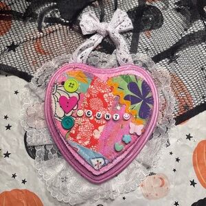 Colorful sassy Heart-Shaped wall decor with Lace Trim. Hand made and handpainted